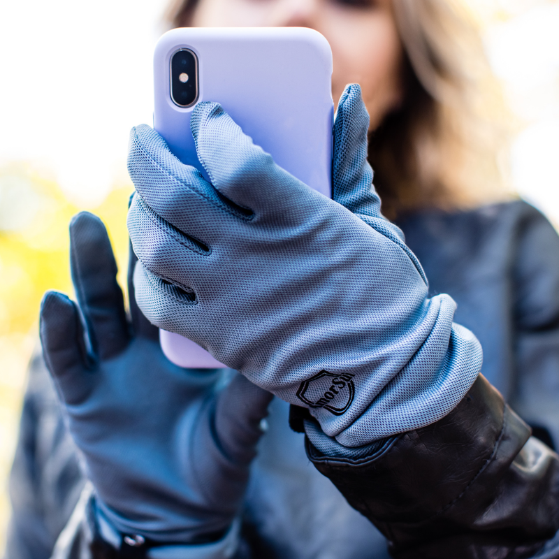 Up close view of a person texting with the Alice™ Antimicrobial Gloves