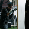 Man practicing boxing wearing AmorSui Antimicrobial Gloves